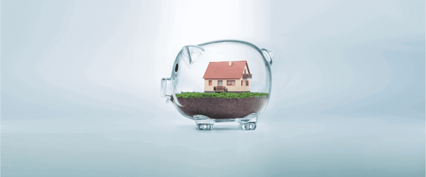 Piggy bank with cash and a house, representing home equity and mortgage options